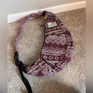 Kavu rope sling crossbody bag. Hiking backpack. Purple/maroon color.